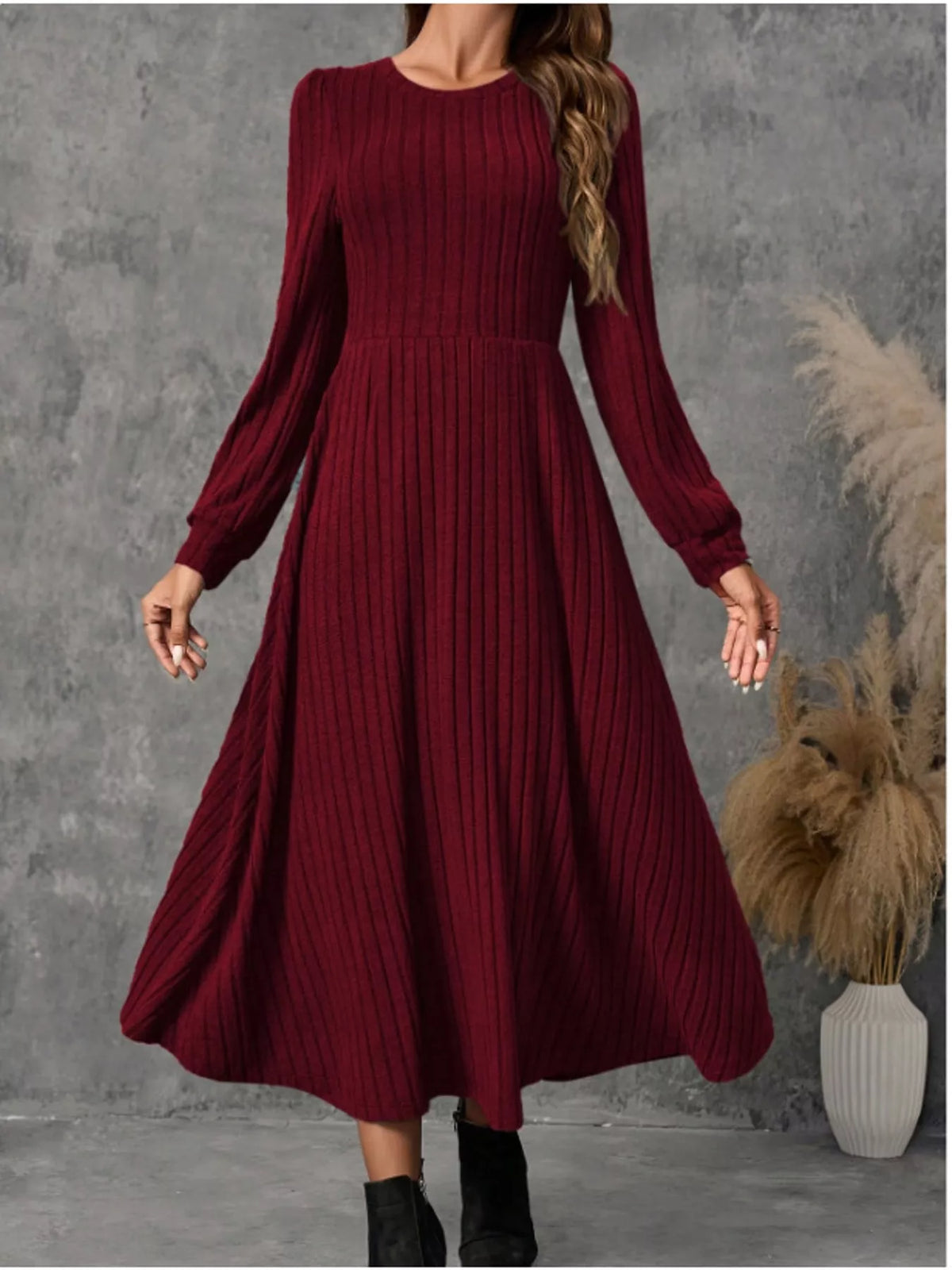 Burgundy ribbed knit long-sleeve A-line midi dress, front view on model.